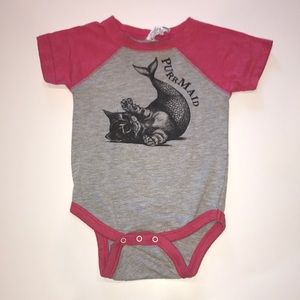 Short sleeve onesie with a bib.